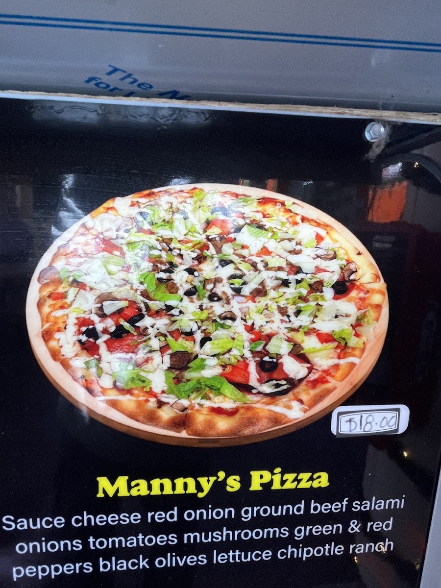 Manny's Pizza Planet Restaurante & Catering menu board