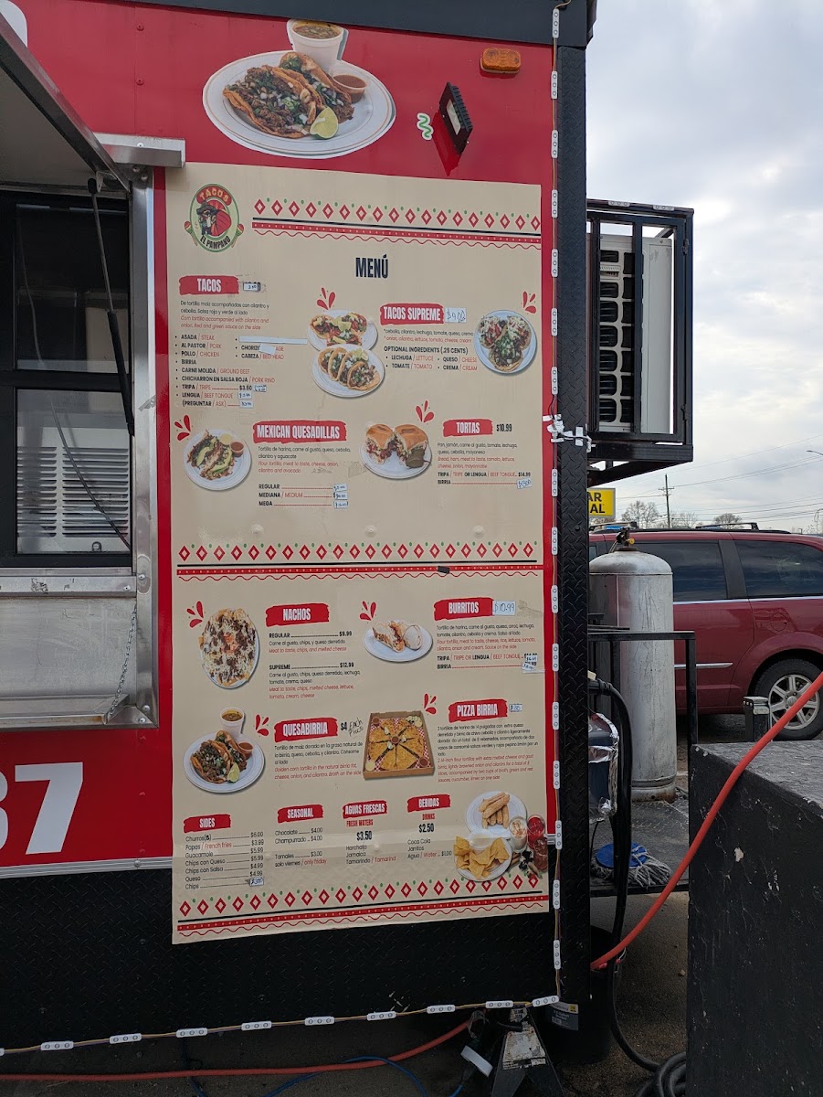 Tacos El Pámpano menu board