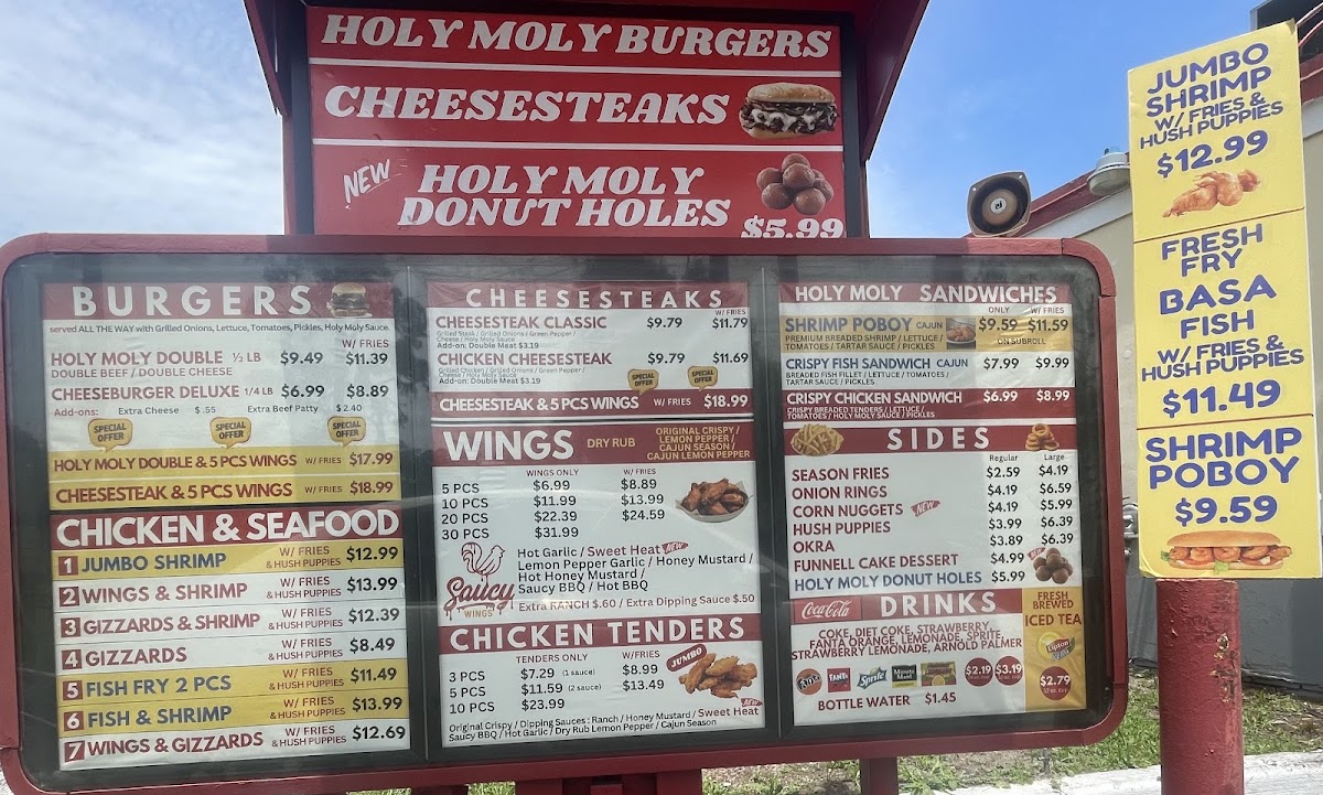 Holy Moly Burgers & the Bird menu board