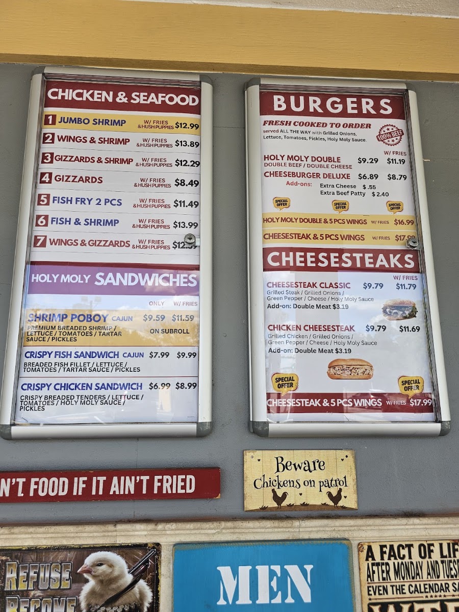 Holy Moly Burgers & the Bird menu board