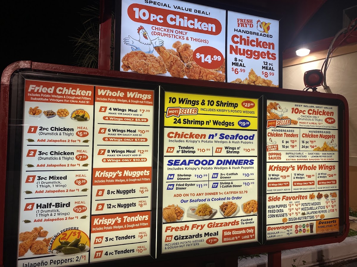 Holy Moly Burgers & the Bird menu board