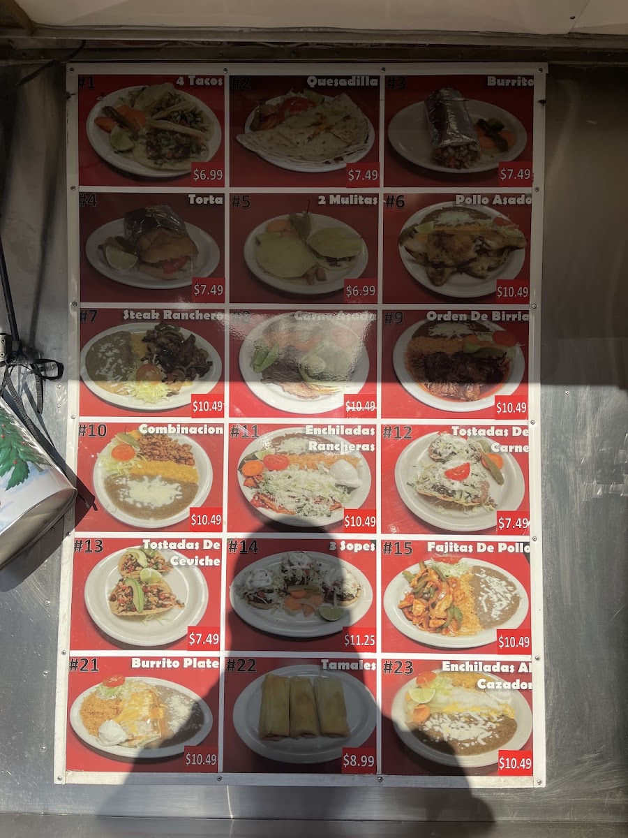 Taqueria El Cazador menu board