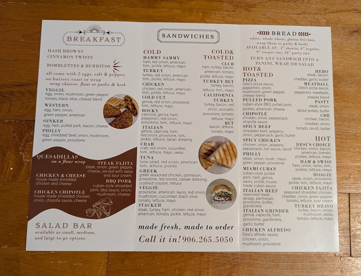 Desi's Subs & Pizza menu board
