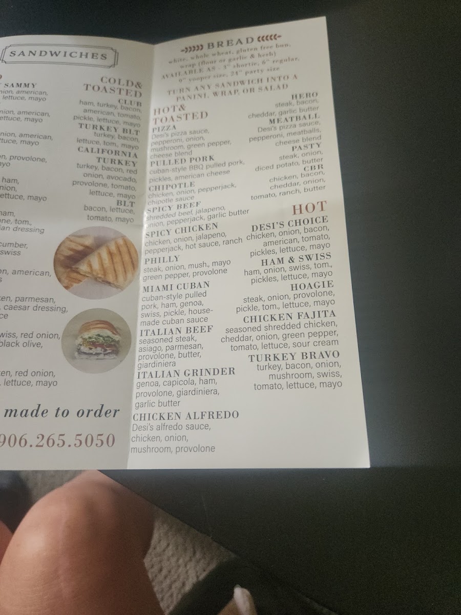 Desi's Subs & Pizza menu board