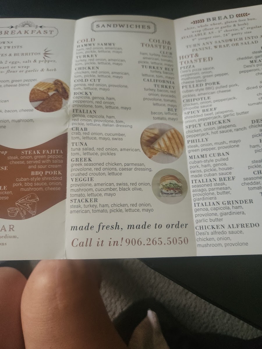 Desi's Subs & Pizza menu board