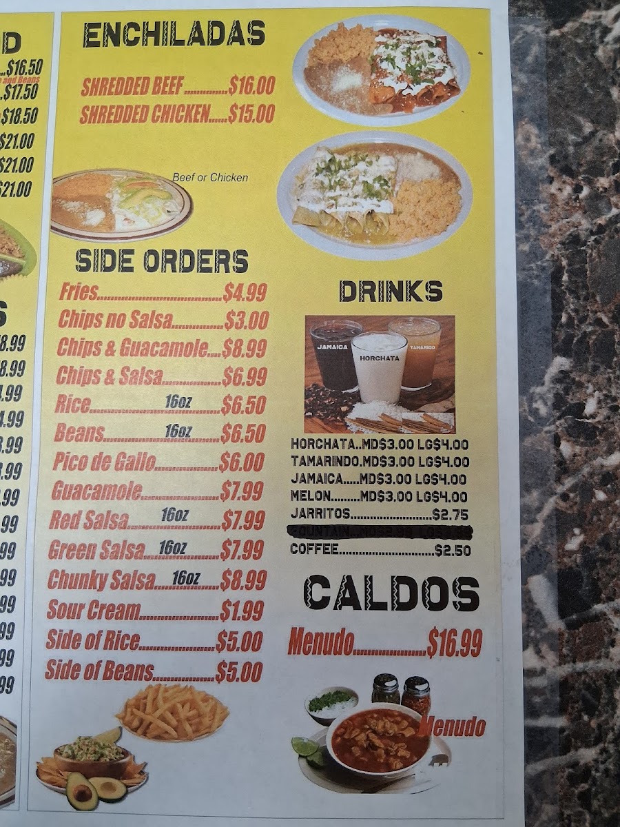 Taqueria El Molcajete menu board