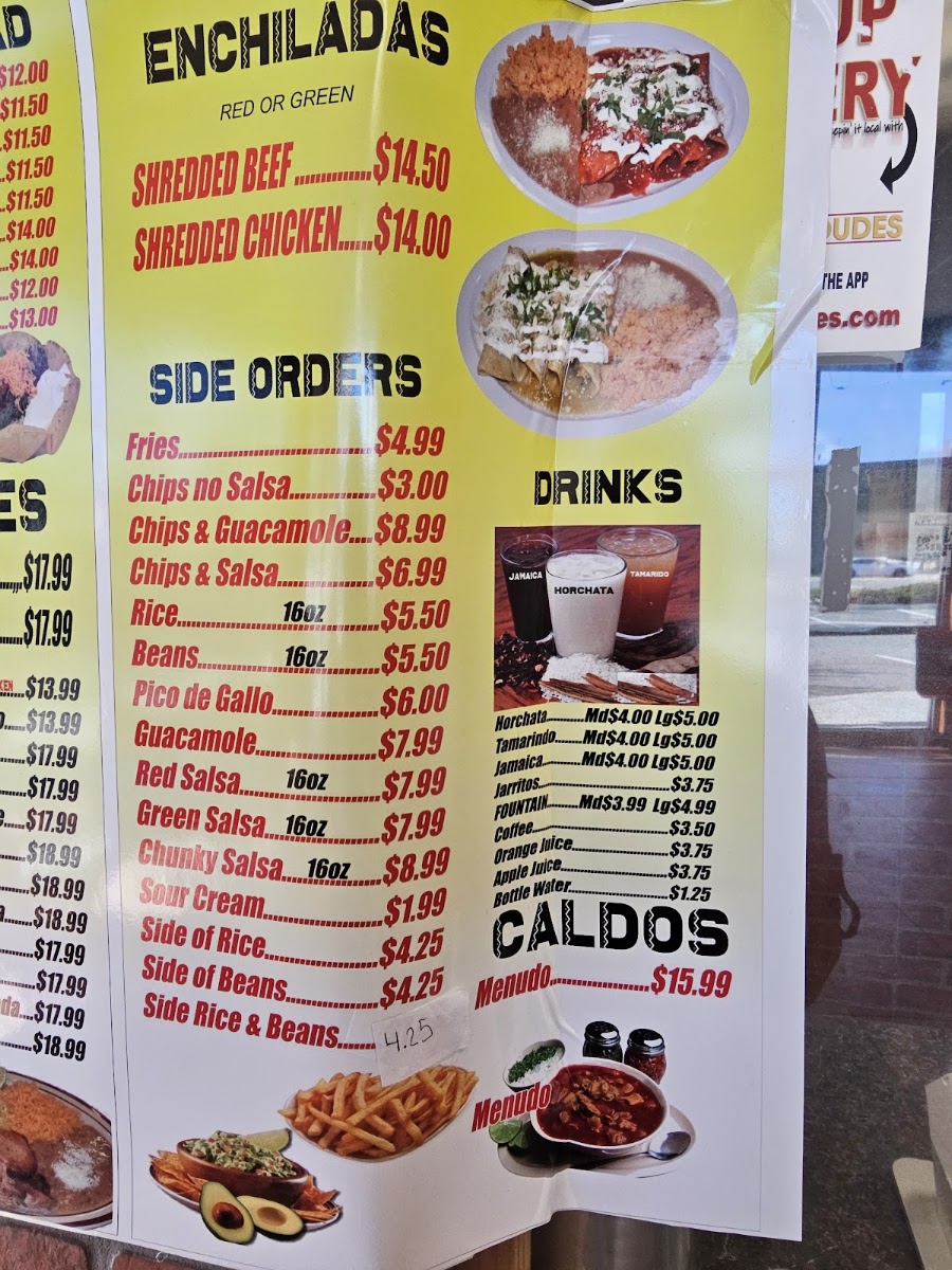 Taqueria El Molcajete menu board