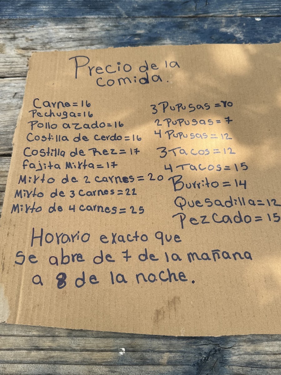 El Chapin taqueria y Pupuseria menu board