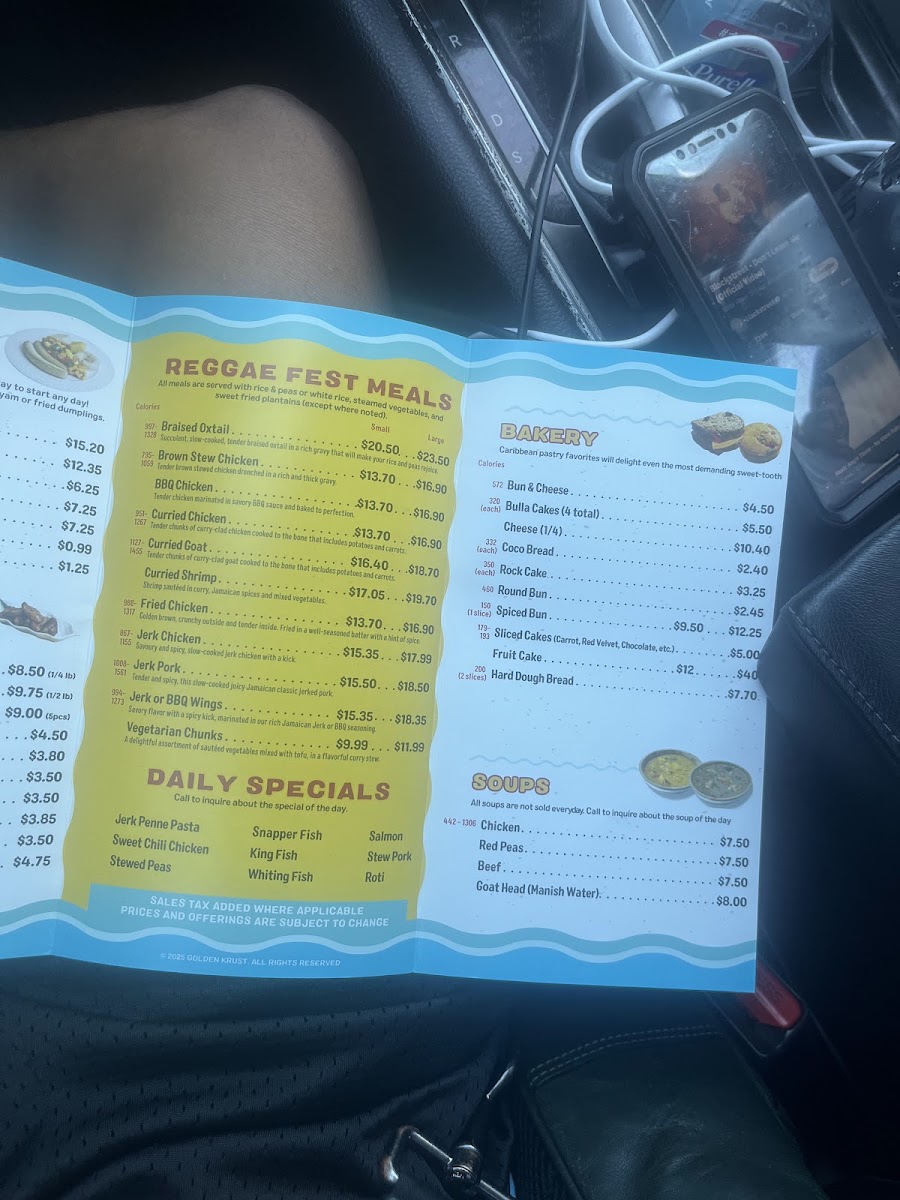 Golden Krust Caribbean Restaurant menu board
