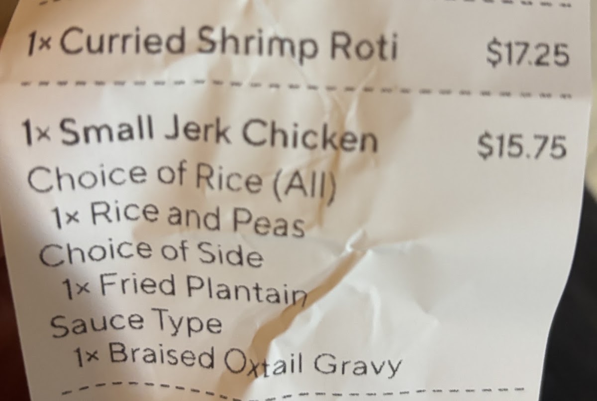 Golden Krust Caribbean Restaurant menu board