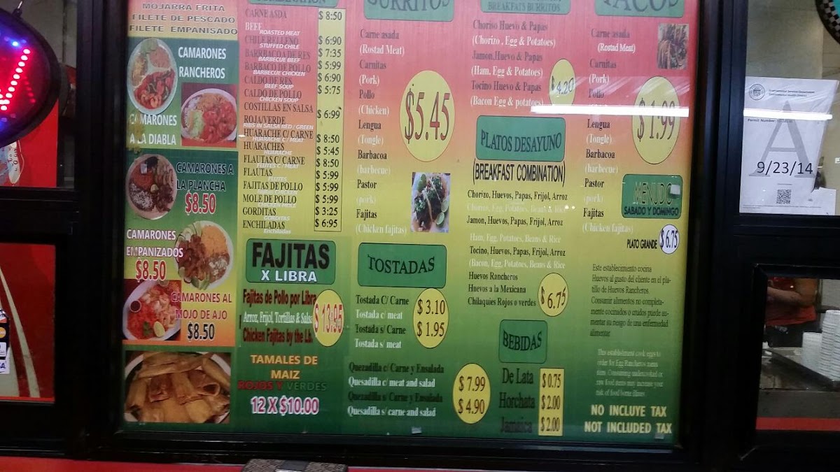 El Sazon Del Sur menu board