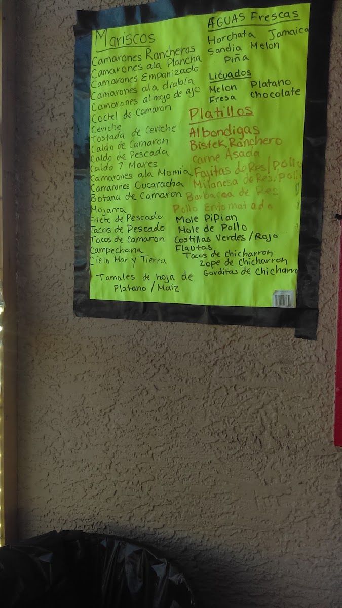 El Sazon Del Sur menu board