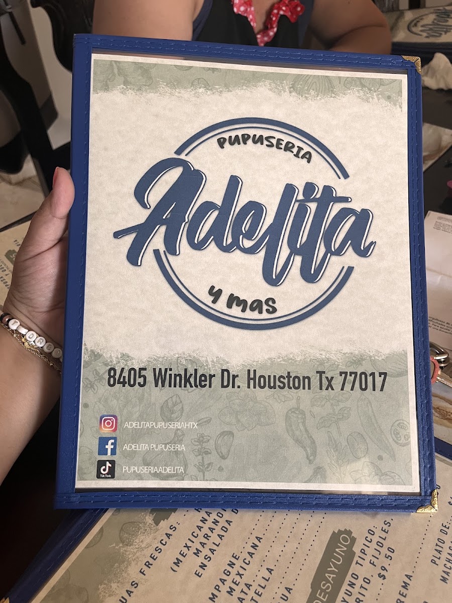 Adelita Pupuseria y Mas restaurante menu board
