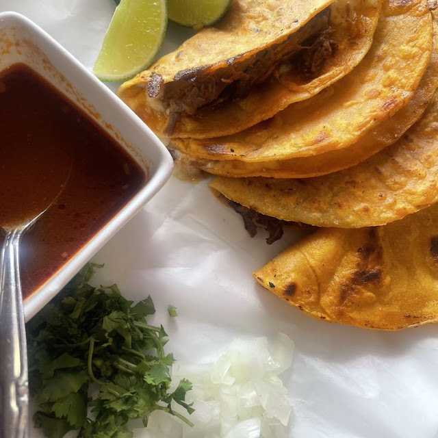 Crispy Birria Tacos with Consommé and Lime