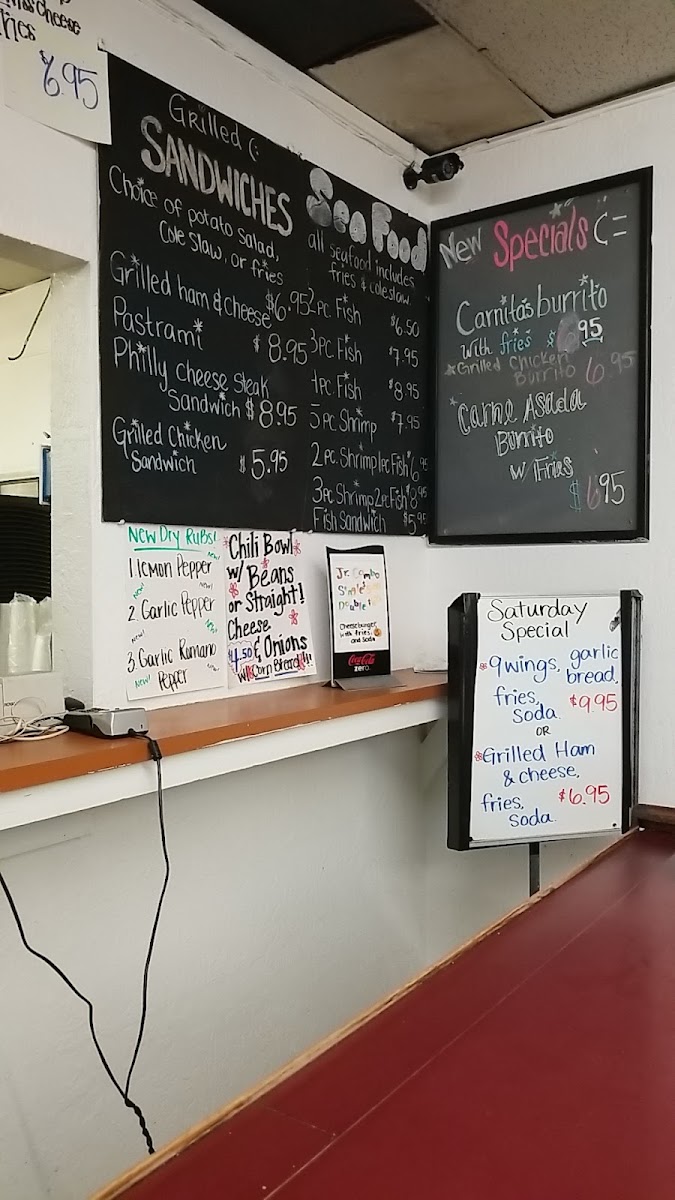 Marcia's Long Wongs menu board