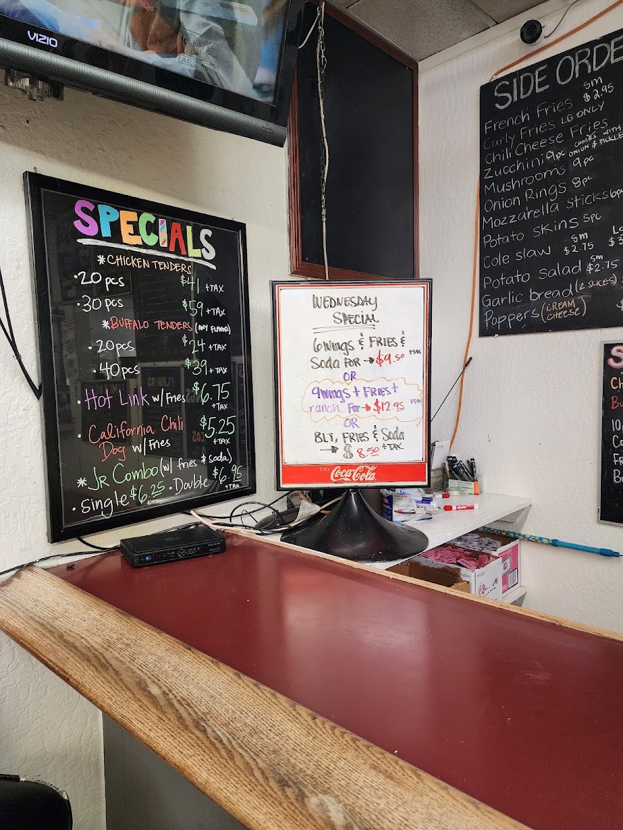 Marcia's Long Wongs menu board