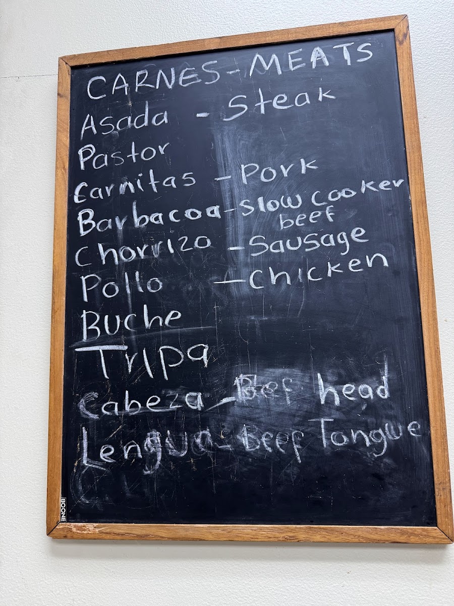 Taquería La Autentica menu board