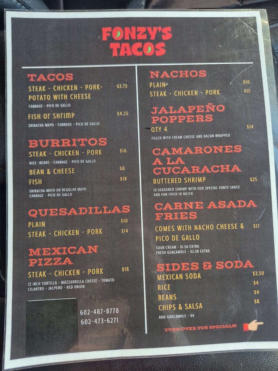Fonzy's Tacos menu board