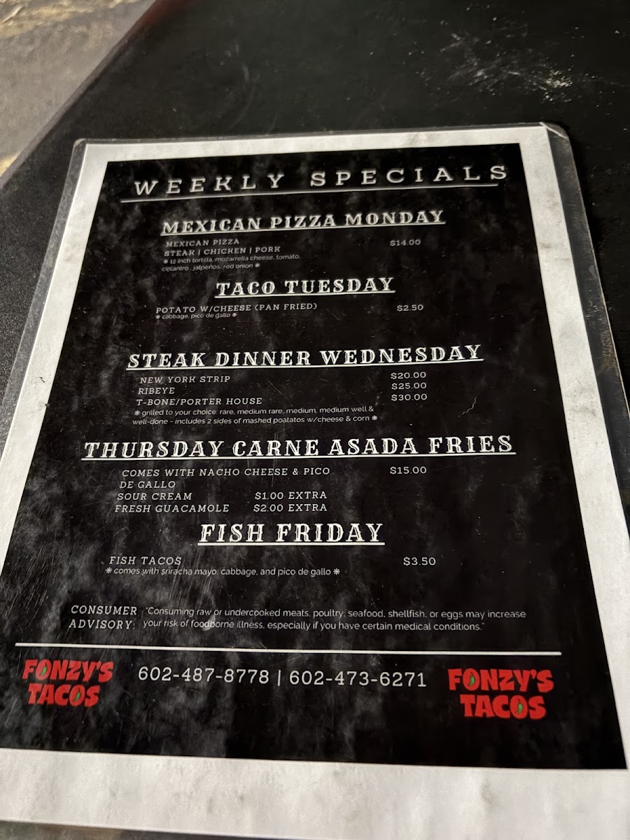 Fonzy's Tacos menu board