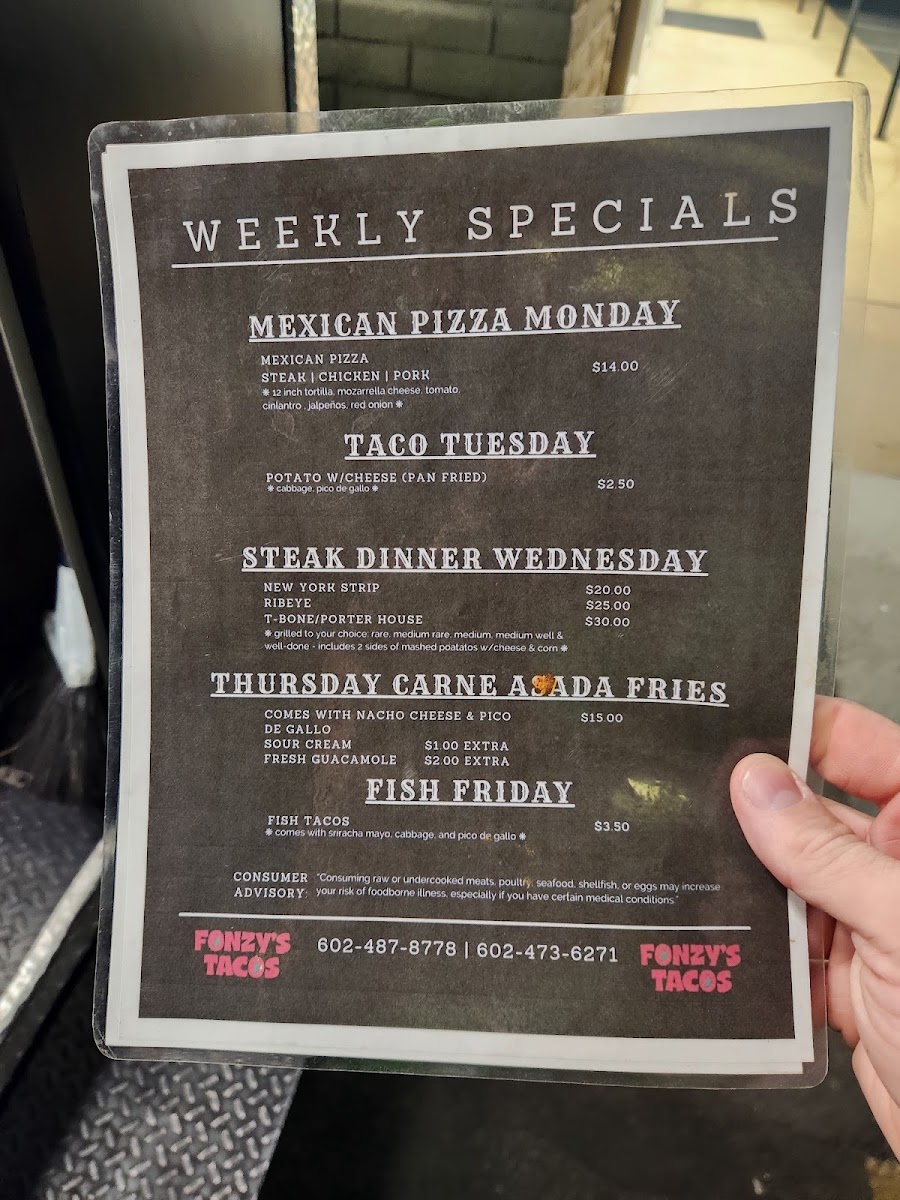 Fonzy's Tacos menu board
