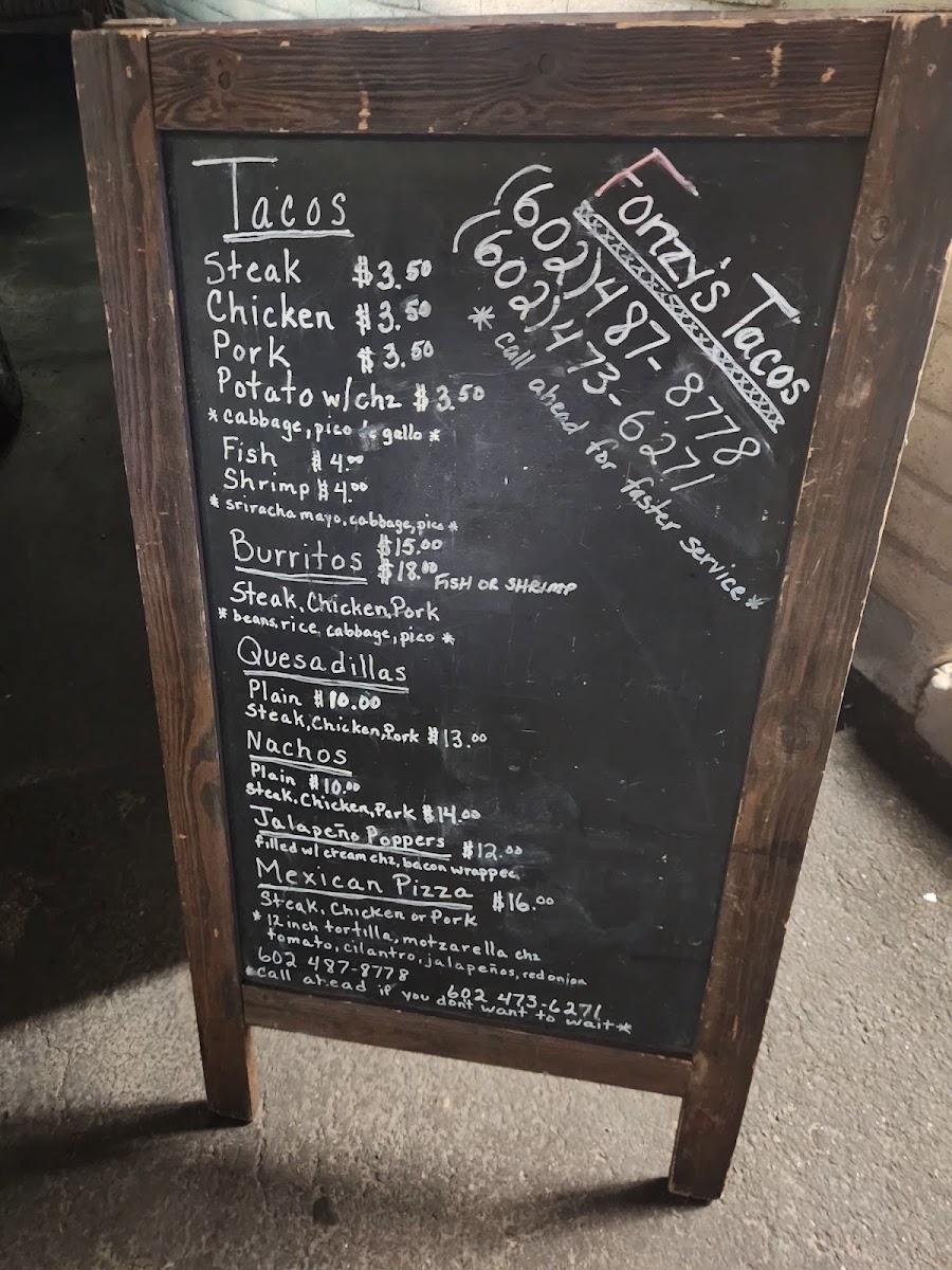 Fonzy's Tacos menu board