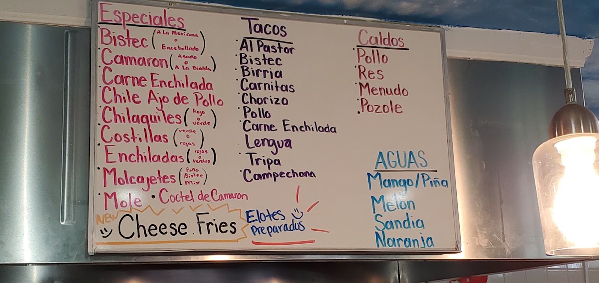 Antojitos y Taqueria Mx menu board