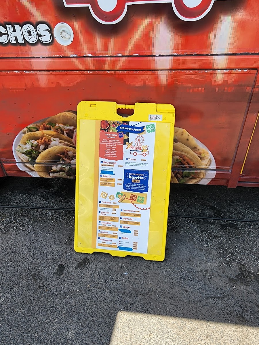 La Feria Taco Truck menu board