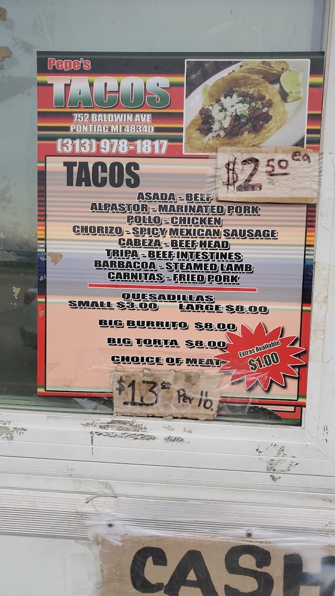 La Feria Taco Truck menu board