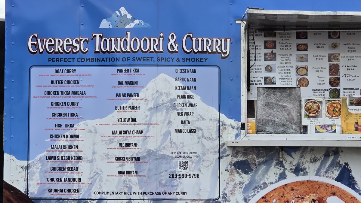 Everest Tandoori & Curry'Best Indian Food In Lathorp' menu board