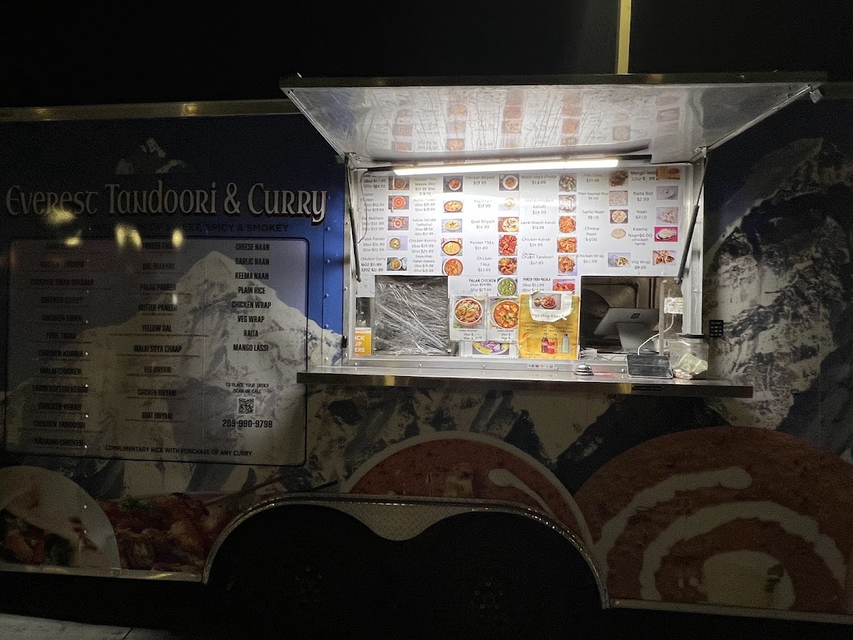 Everest Tandoori & Curry'Best Indian Food In Lathorp' menu board