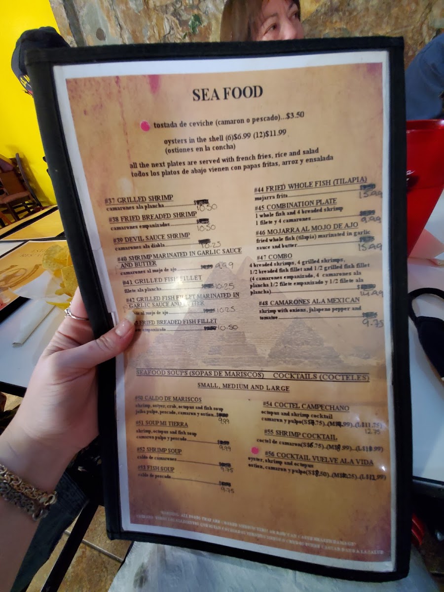 Estrella Restaurant Mexican Food menu board