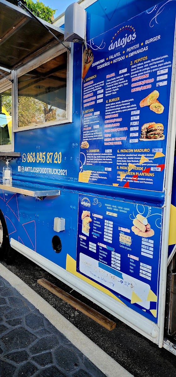 Antojos Food Truck menu board