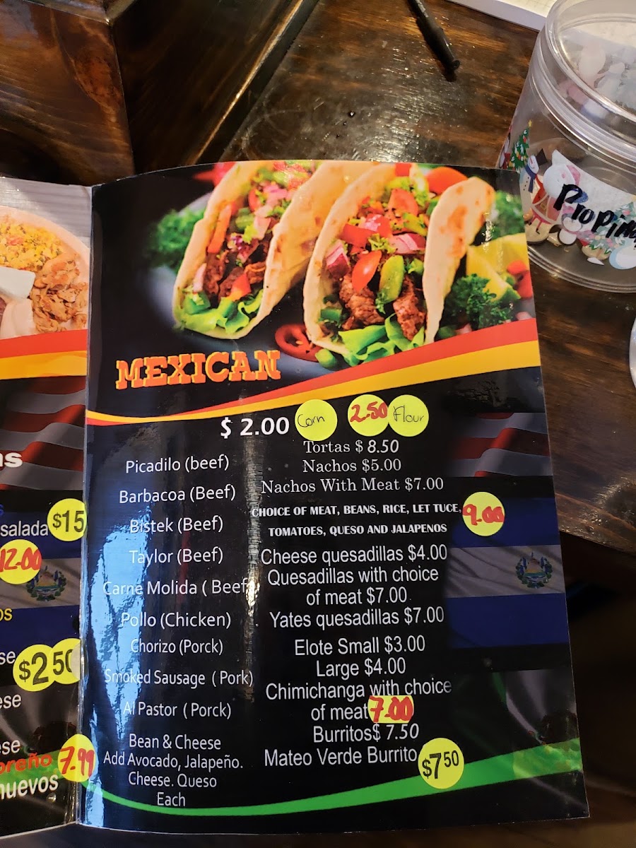 Lilys Tacos y Pupuseria menu board