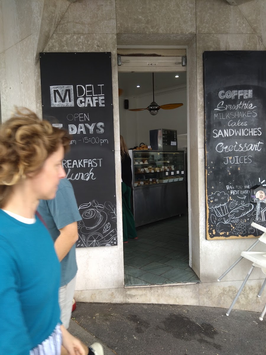 M Deli Cafe menu board