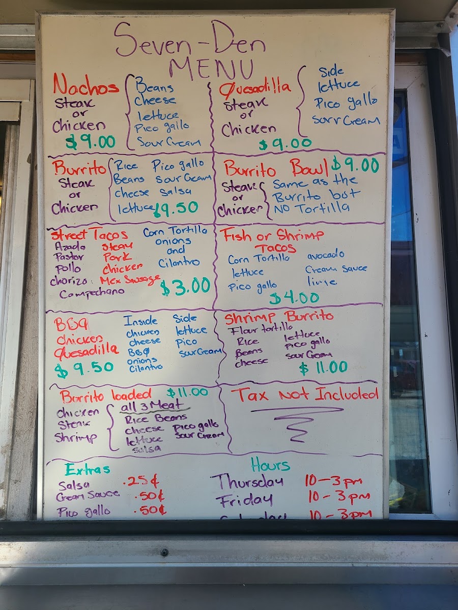 Seven Den Tacos menu board