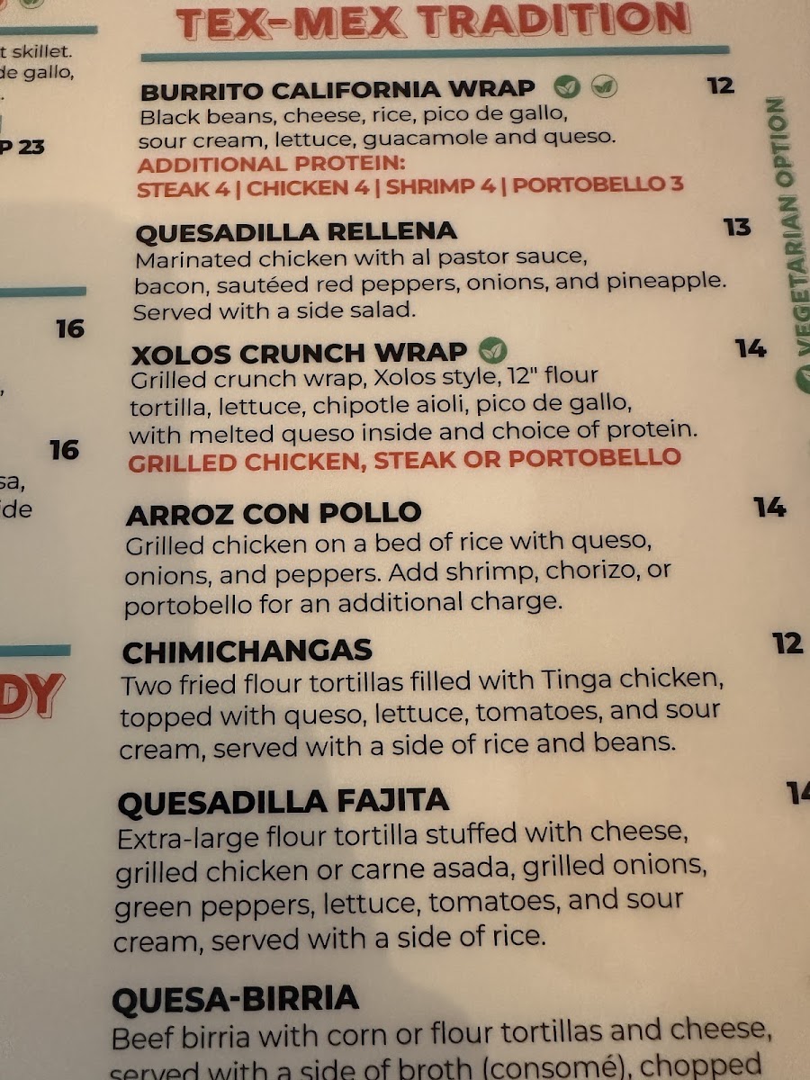 Xolos Tacos Y Tlayudas menu board