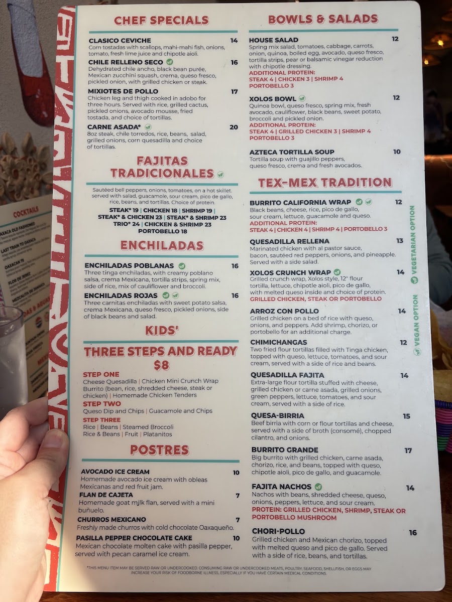 Xolos Tacos Y Tlayudas menu board