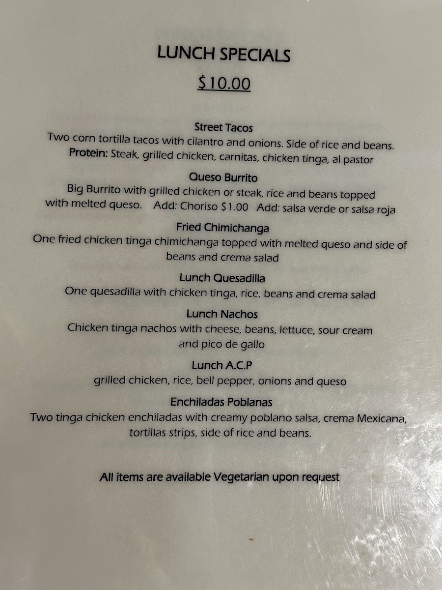 Xolos Tacos Y Tlayudas menu board
