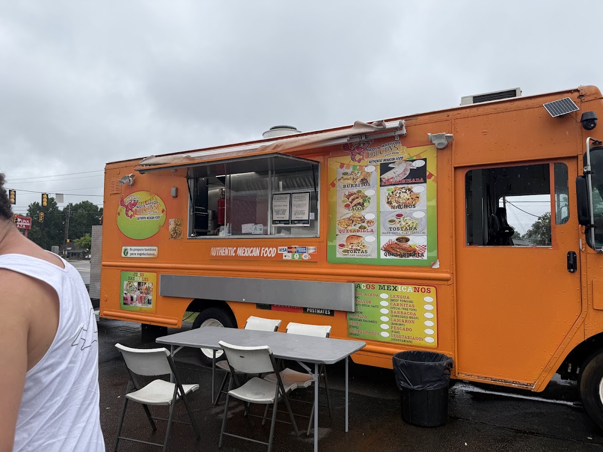 Tacos & Mariscos Dilcia’s Food Truck menu board