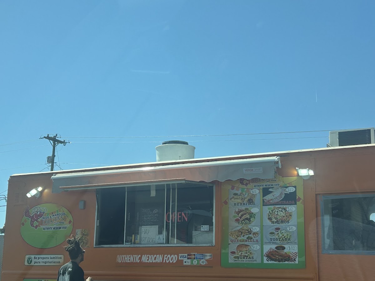 Tacos & Mariscos Dilcia’s Food Truck menu board