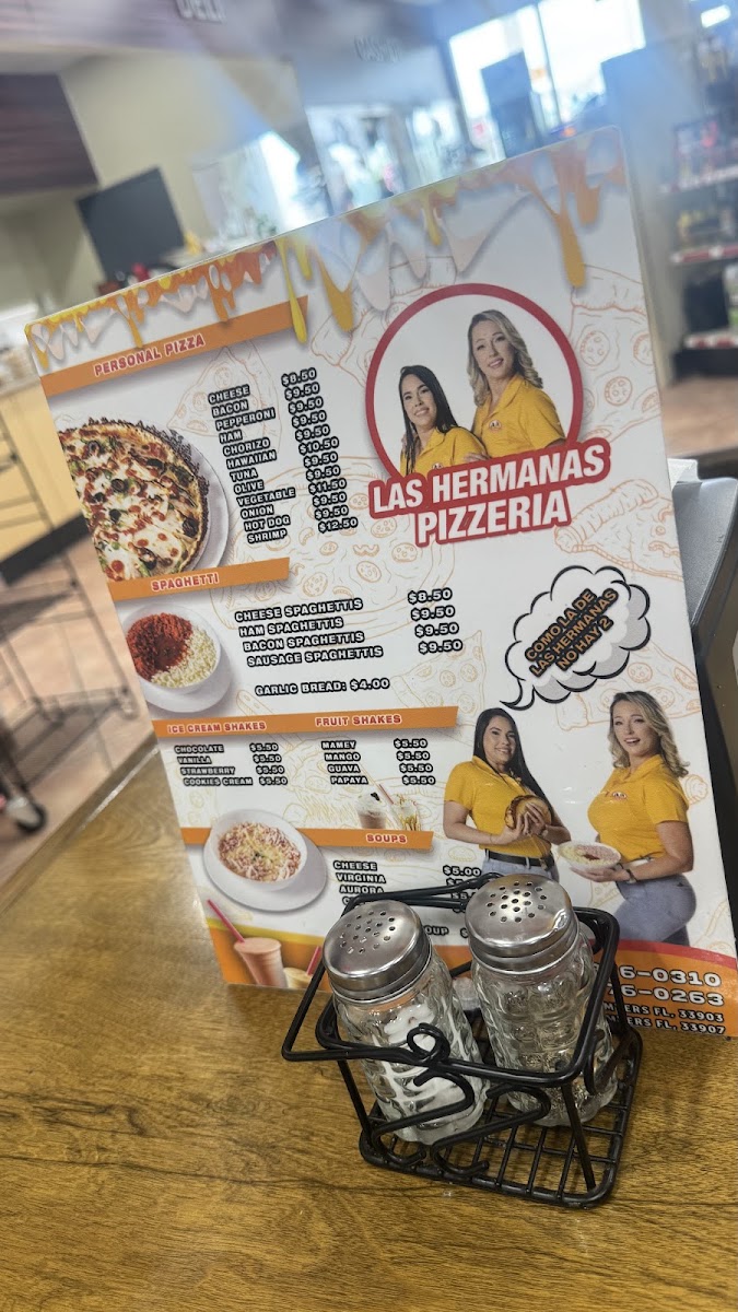 Las Hermanas Pizzeria menu board