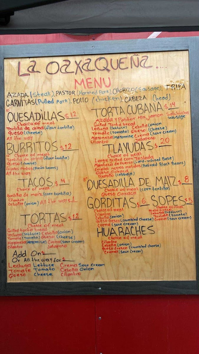 Taqueria La Oaxaqueña menu board