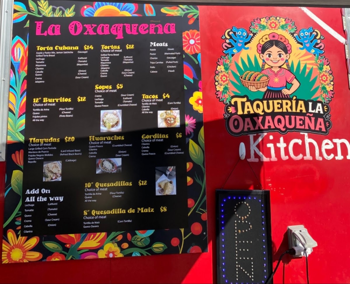 Taqueria La Oaxaqueña menu board