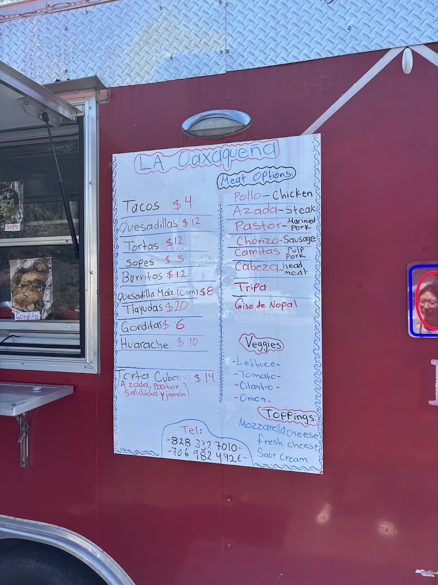 Taqueria La Oaxaqueña menu board