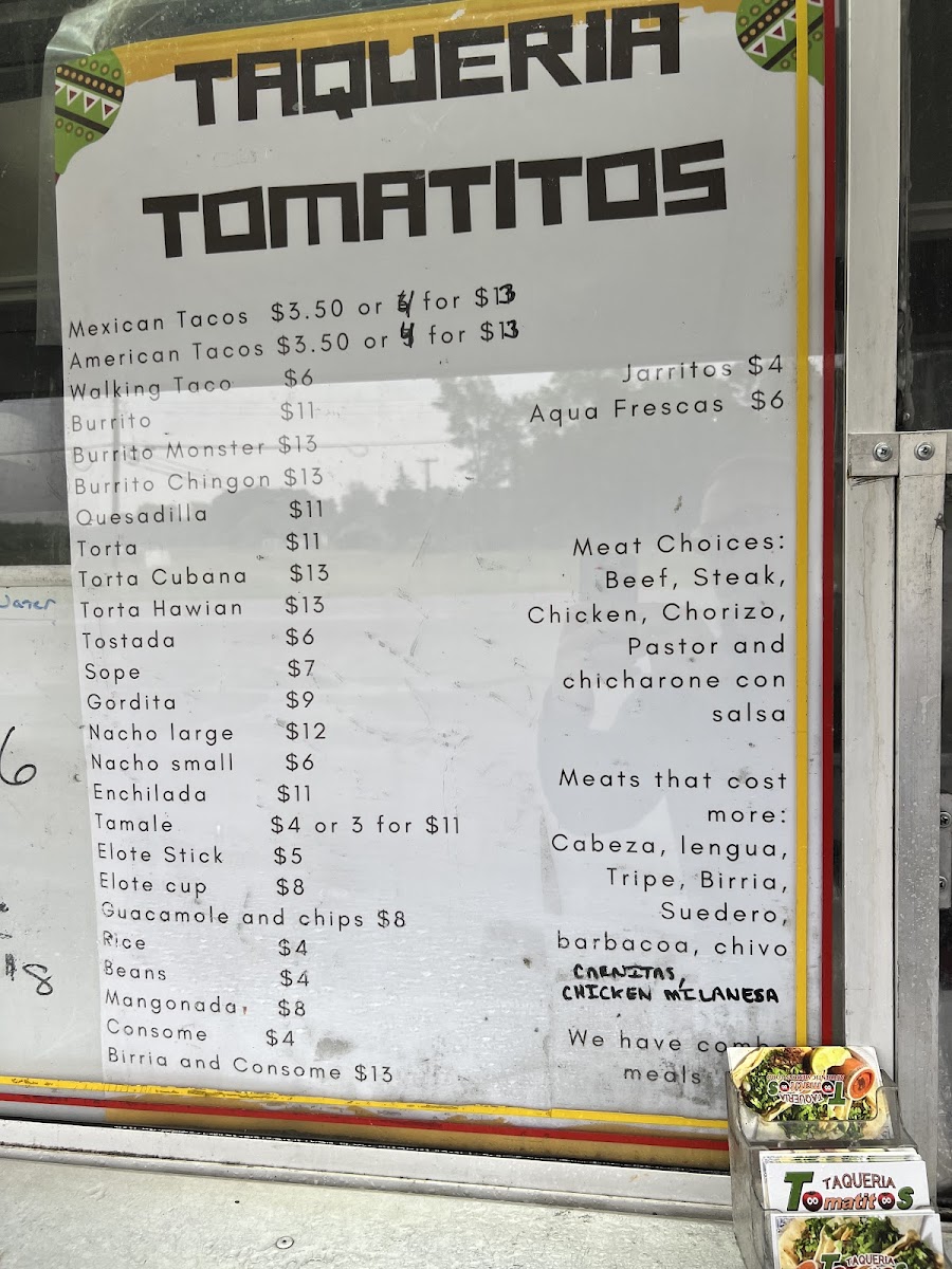 Taqueria Tomatitos food truck menu board