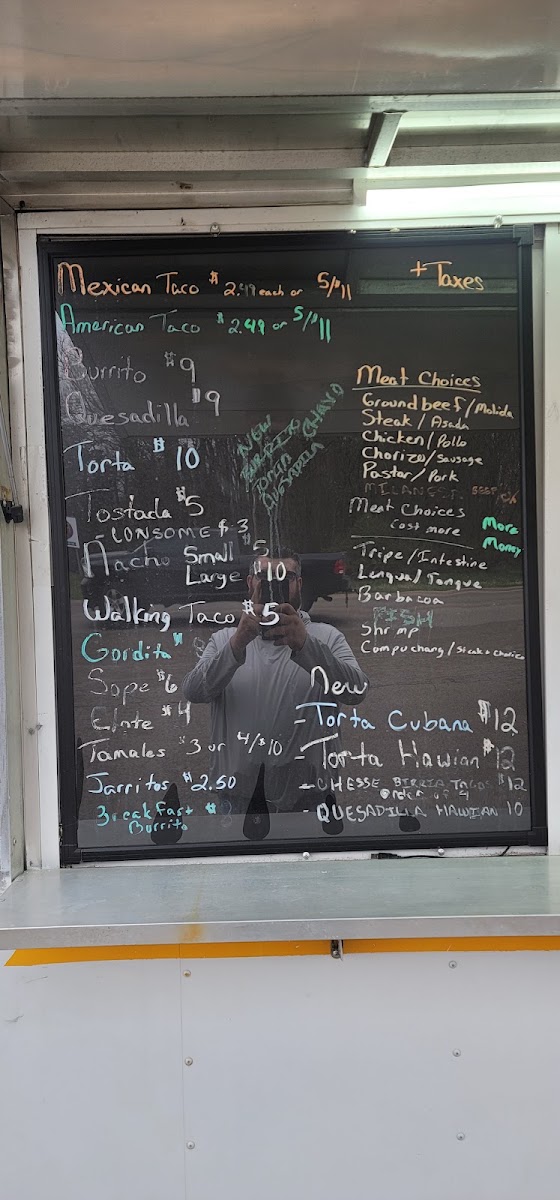 Taqueria Tomatitos food truck menu board