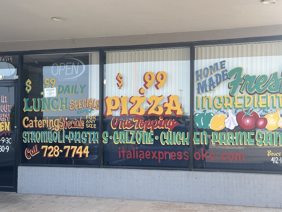 Italia Express Pizza & Pasta menu board