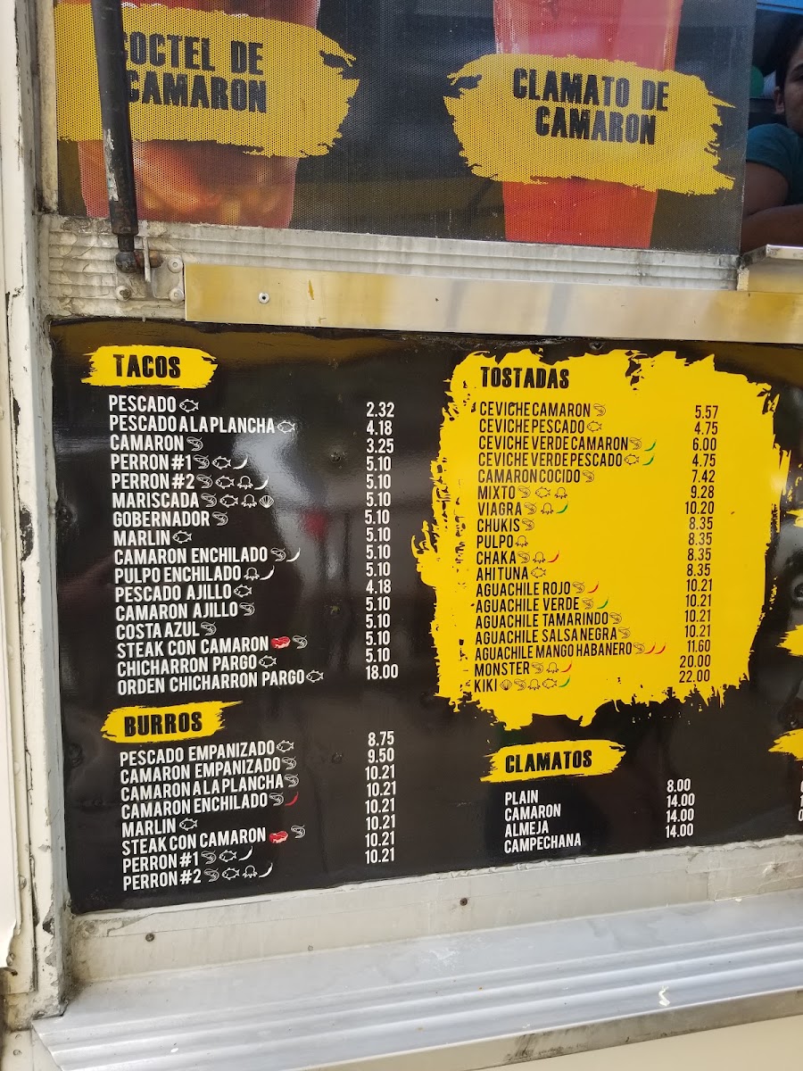 Taqueria y mariscos el kiki menu board