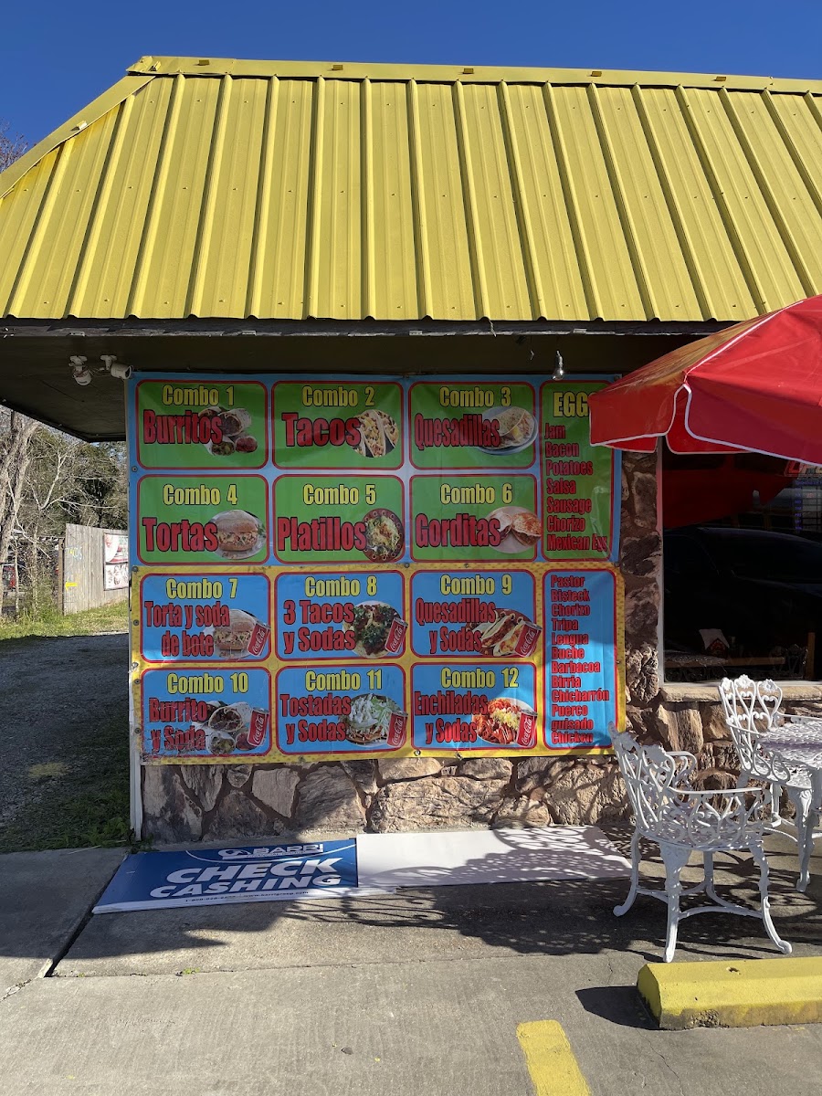El auténtico taco él caporal menu board