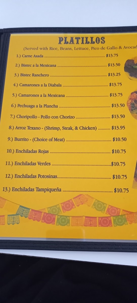 Taquería Milagro menu board